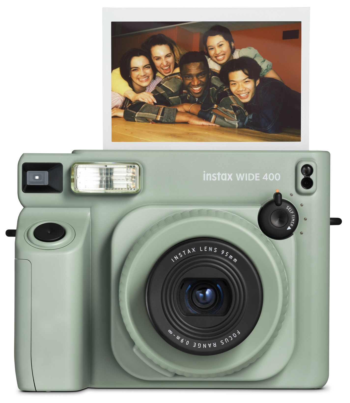 Miętowa kamera instax ze zdjęciem uśmiechniętej grupy osób.