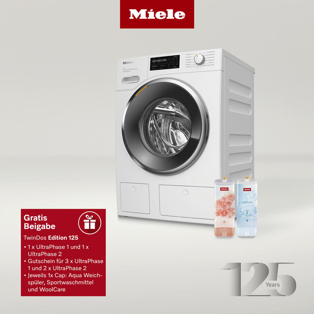 Eine weiße Waschmaschine mit rotem Miele-Logo und zwei Waschmittelflaschen.