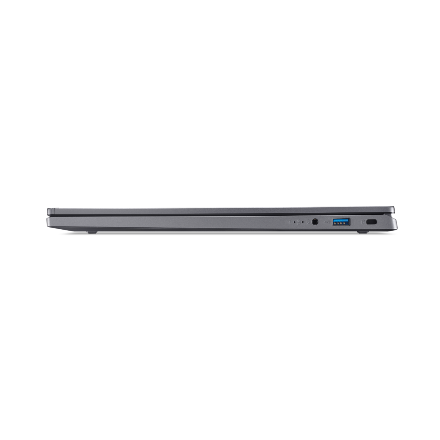 A closed gray laptop is seen from the side against a black background. Ports and a power button are visible.