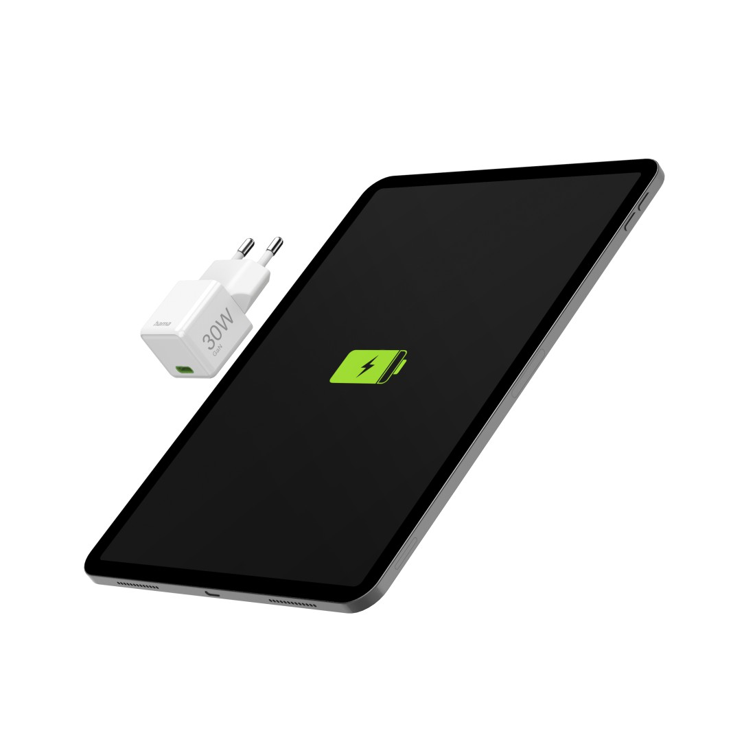 Schwarzes Tablet, das mit grünem Ladesymbol lädt. Weißer Ladeadapter daneben.