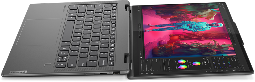 Nyitott laptop, látható billentyűzet, a jobb oldalon kép szerkesztő felület látható.