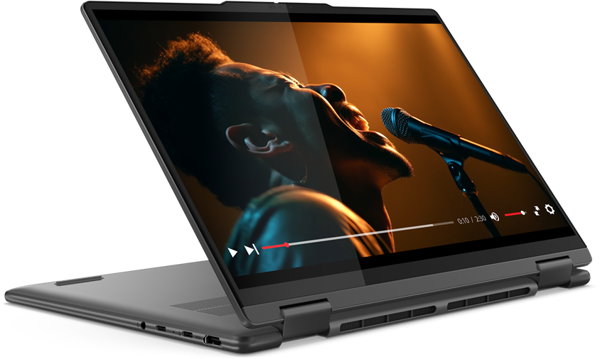Laptop videó lejátszással, egy éneklő embert mutatva.