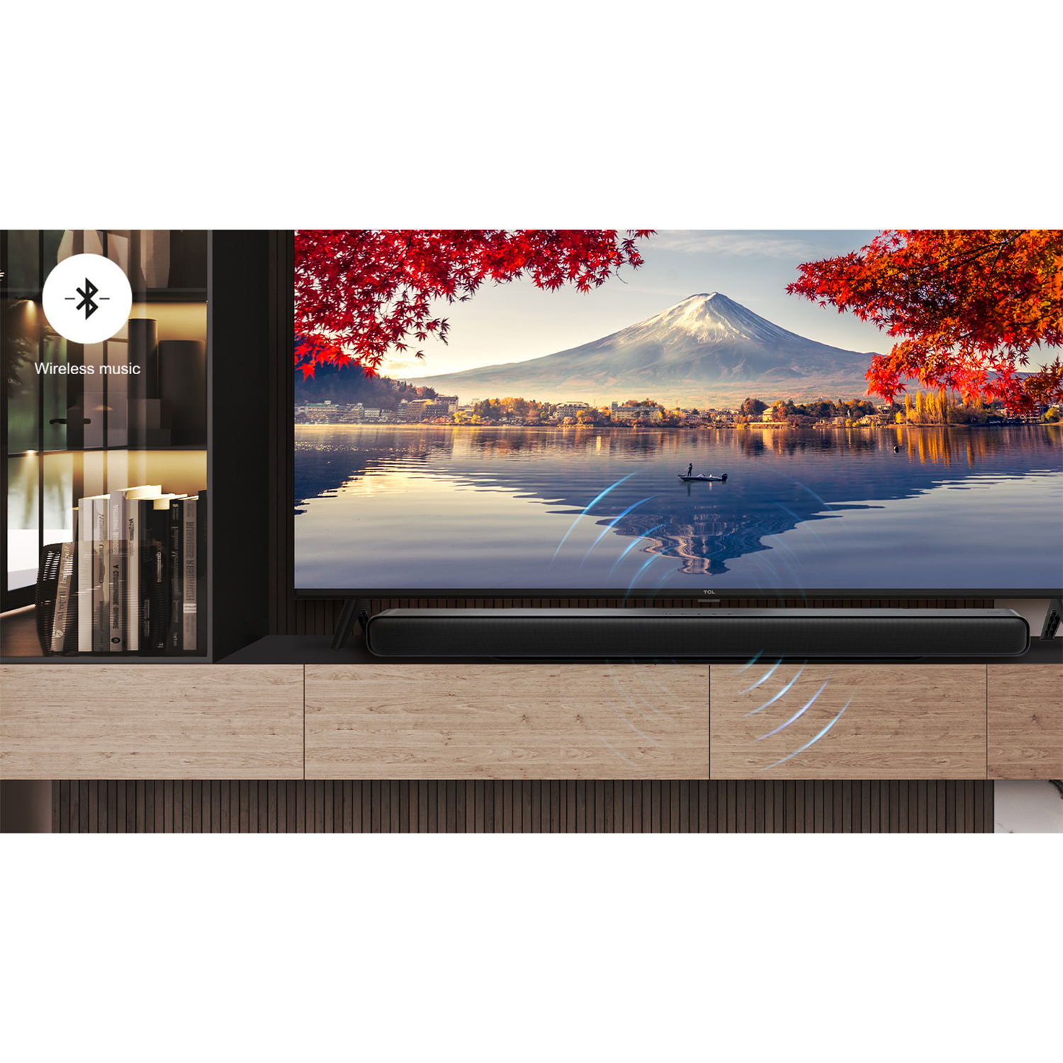 Uno schermo TV con una scena di montagna e una soundbar sotto.