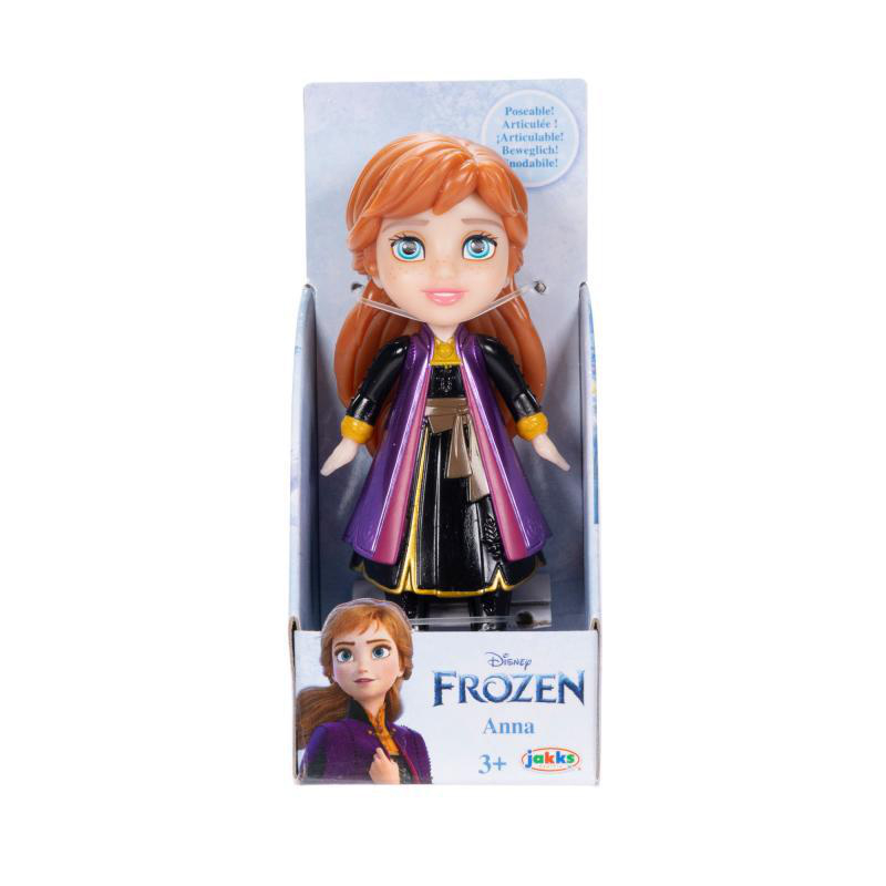 Frozen Anna-Puppe in Verpackung. Puppe hat rotes Haar, lila Kleid und lächelt.