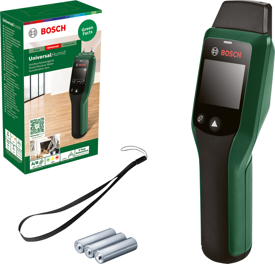 Bosch UniversalHumid fa nedvességmérő és tartozékok fehér felületen. A mérő és a doboz zöld.