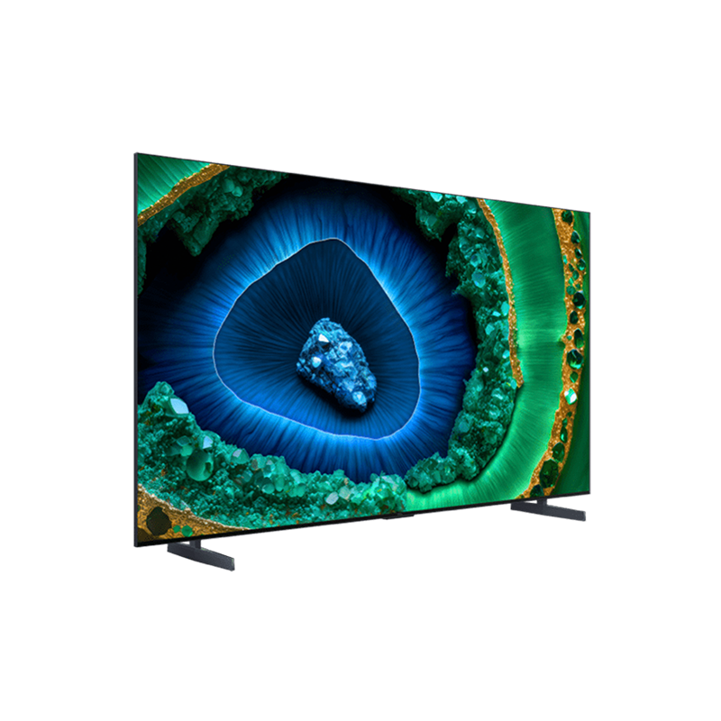 Renkli soyut bir tasarım gösteren bir TV. Koyu renk bacakları ve siyah bir çerçevesi var.
