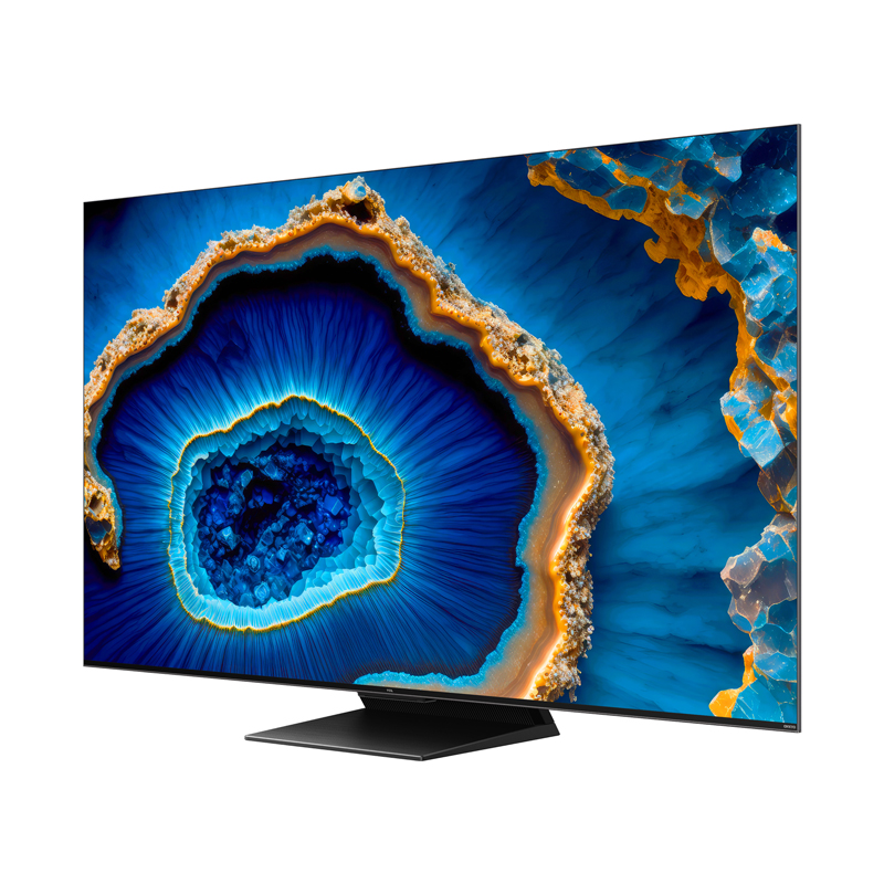 Jeot'a benzeyen mavi ve altın soyut bir tasarım sergileyen büyük TV.