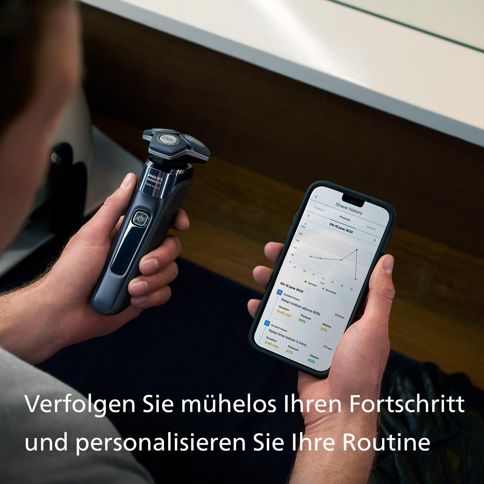 Hände halten Rasierer und Telefon mit Rasierverlauf, Text auf Deutsch.