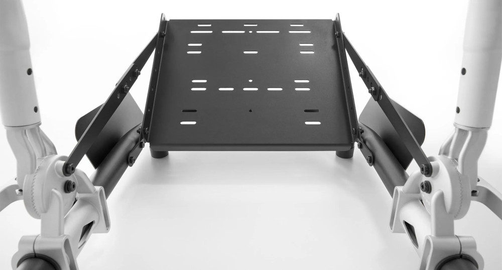 Metal stand with two white legs. Black platform with holes. White background.