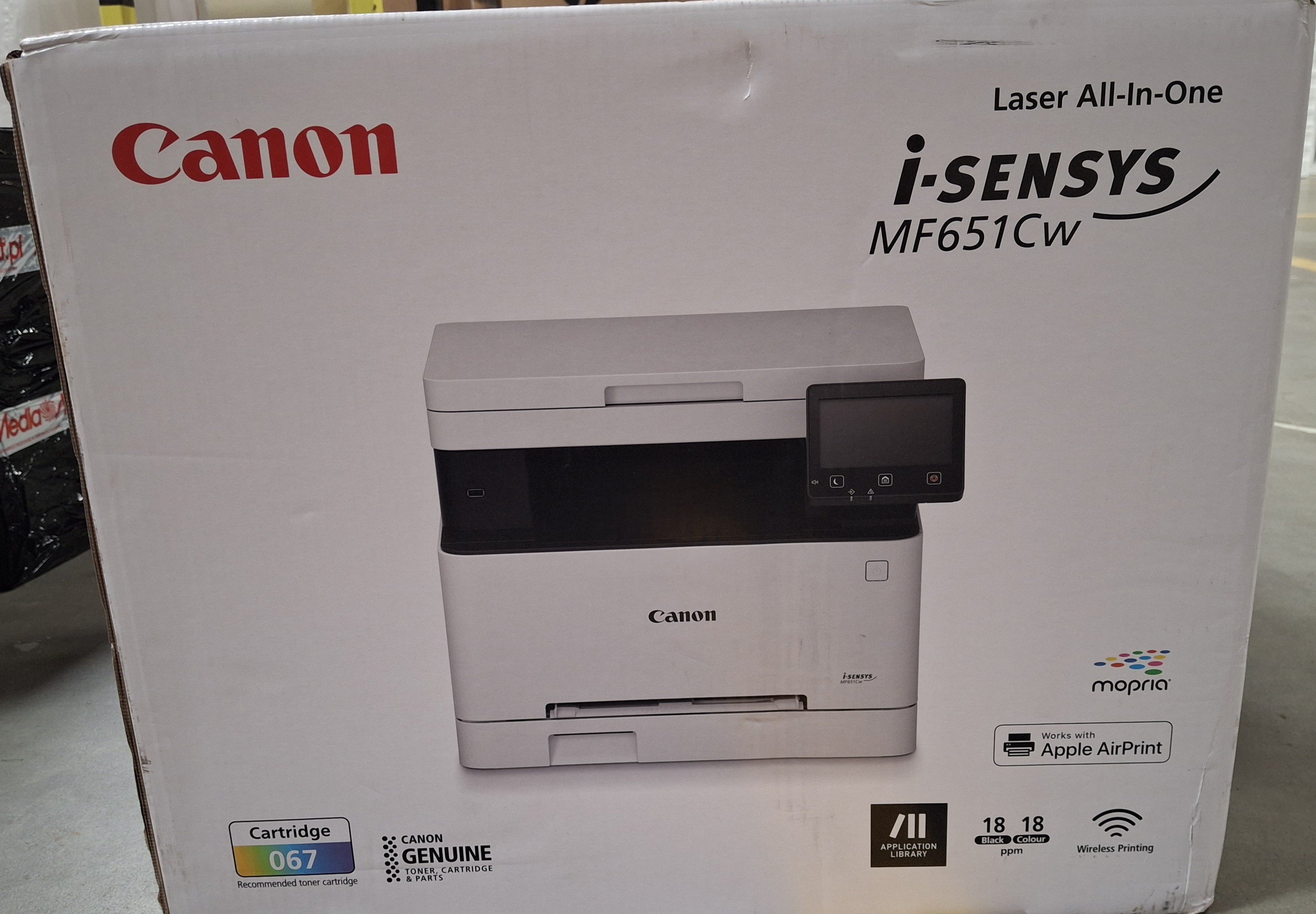 Pudełko drukarki Canon i-SENSYS, biało-czarne z ekranem.