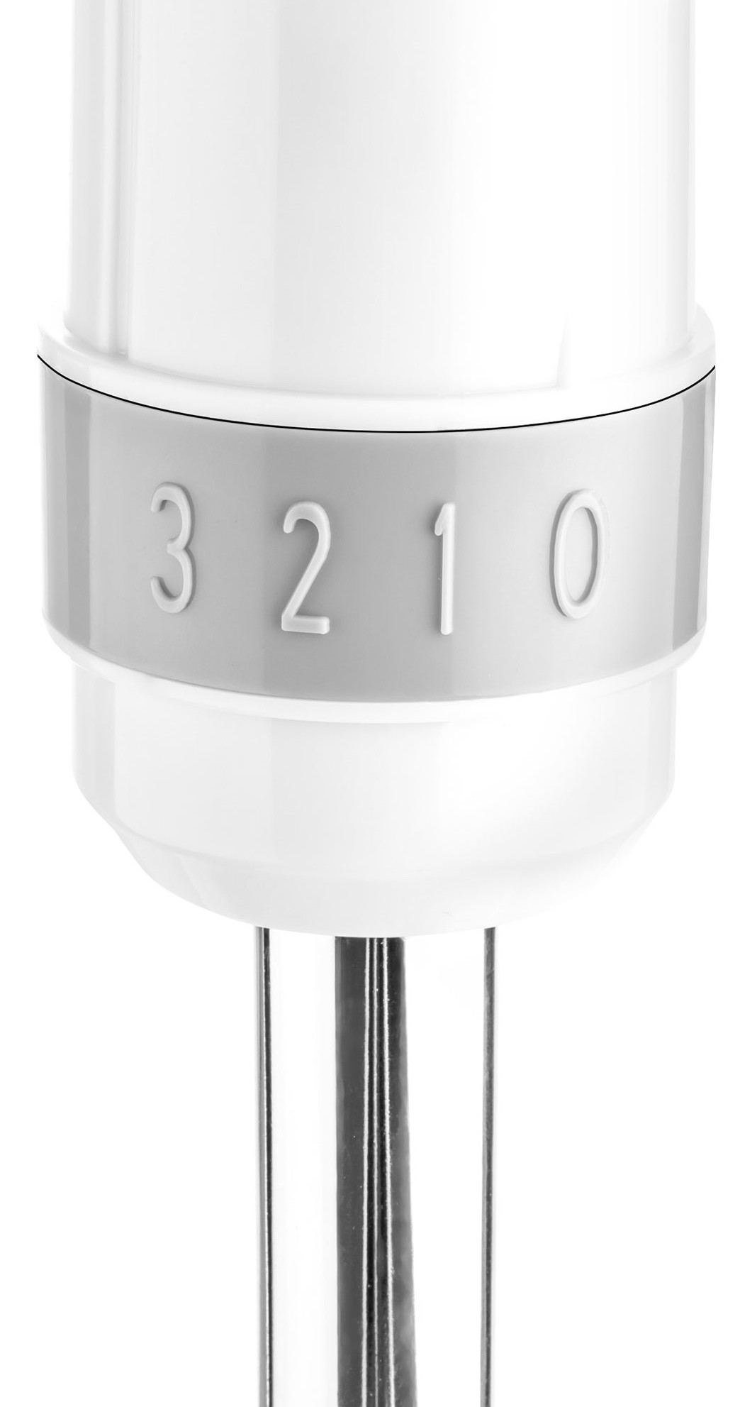Zbliżenie białego urządzenia z szarym paskiem z numerami 3, 2, 1 i 0. Poniżej rozciąga się srebrny wał.