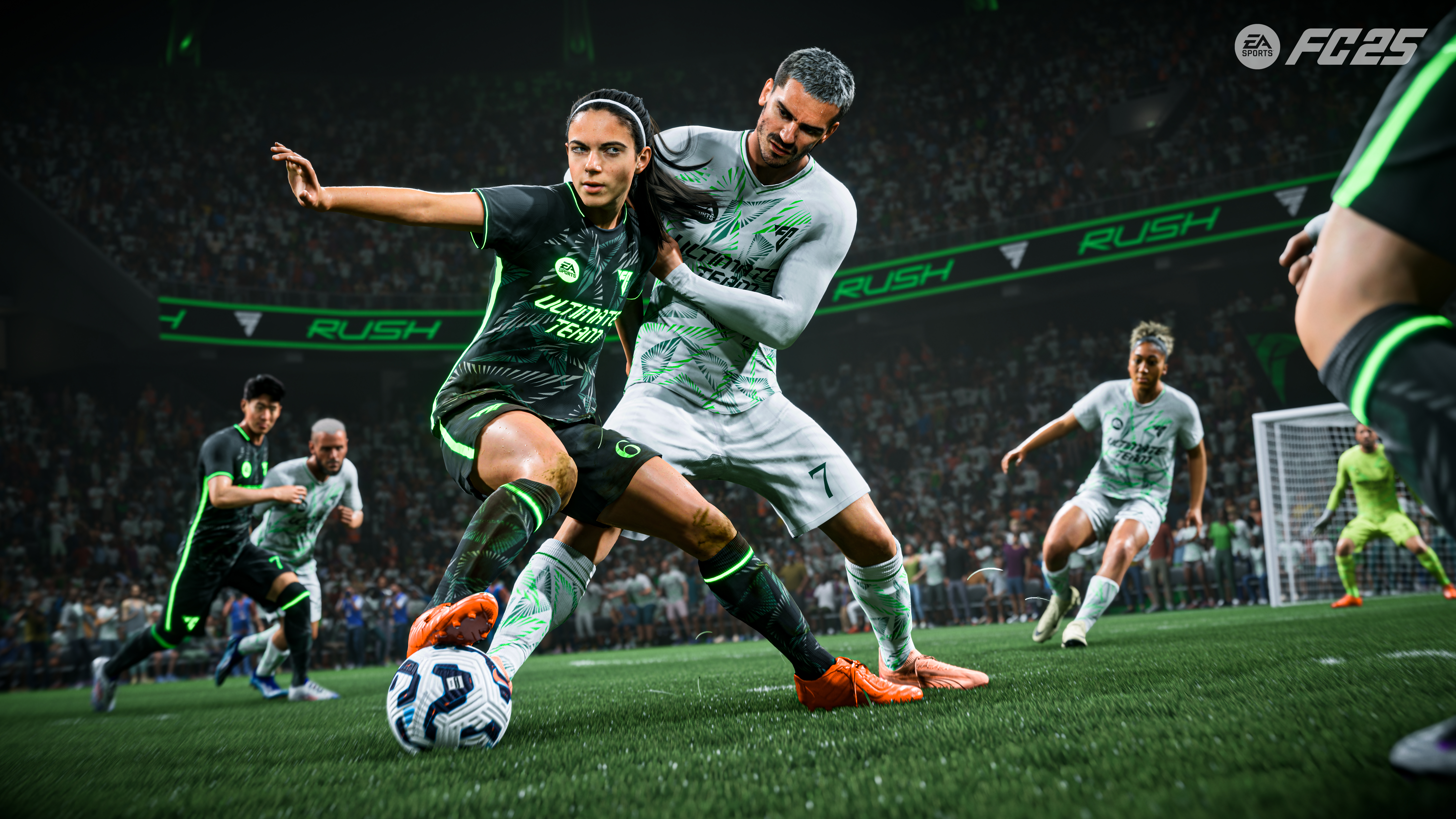Match de football. Deux joueurs en uniformes verts et blancs se disputent le ballon. Public en arrière-plan.