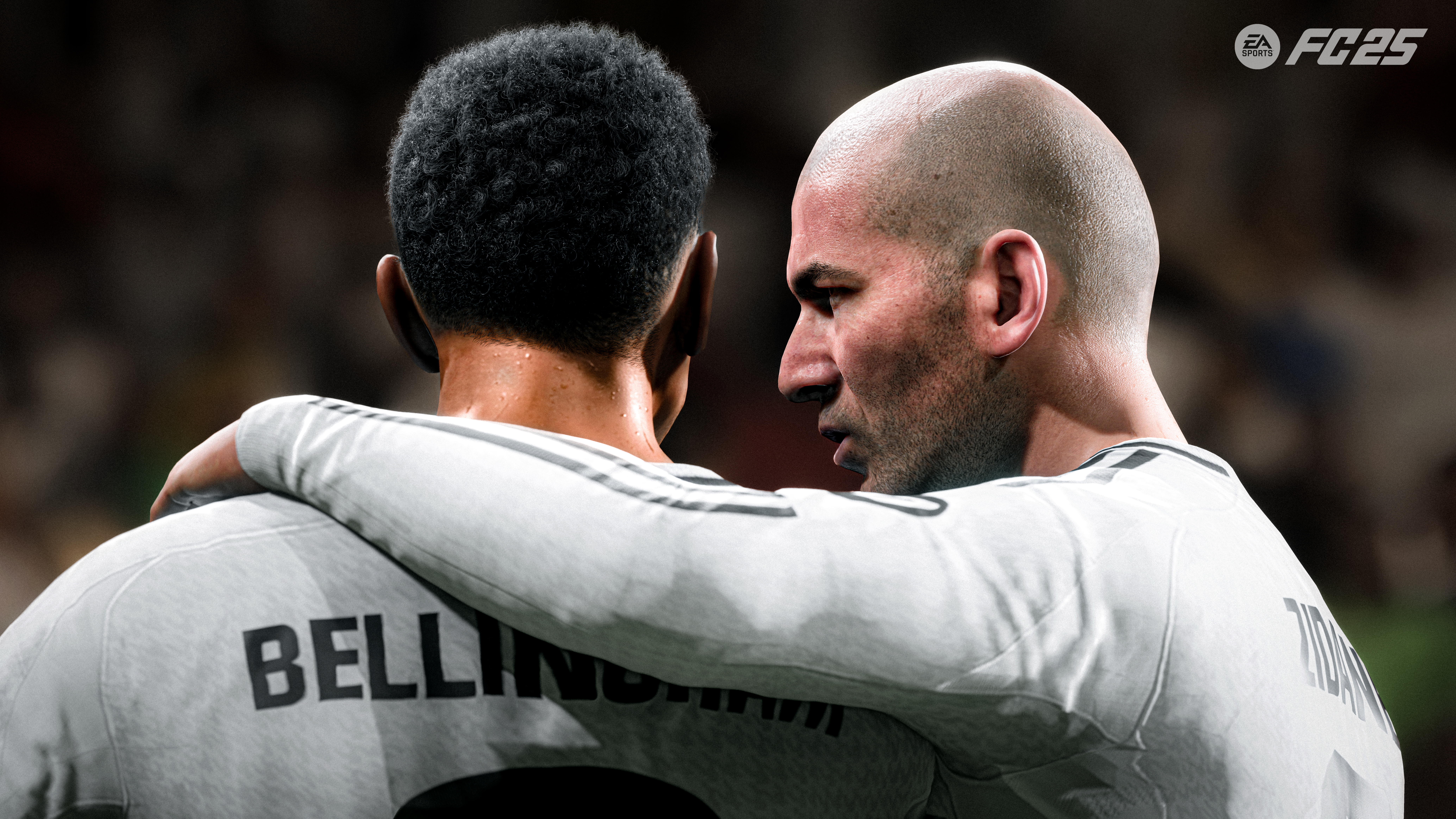 Deux hommes en maillots blancs s'embrassent. L'un est chauve. Texte sur le maillot: 'BELLIGHAM'.