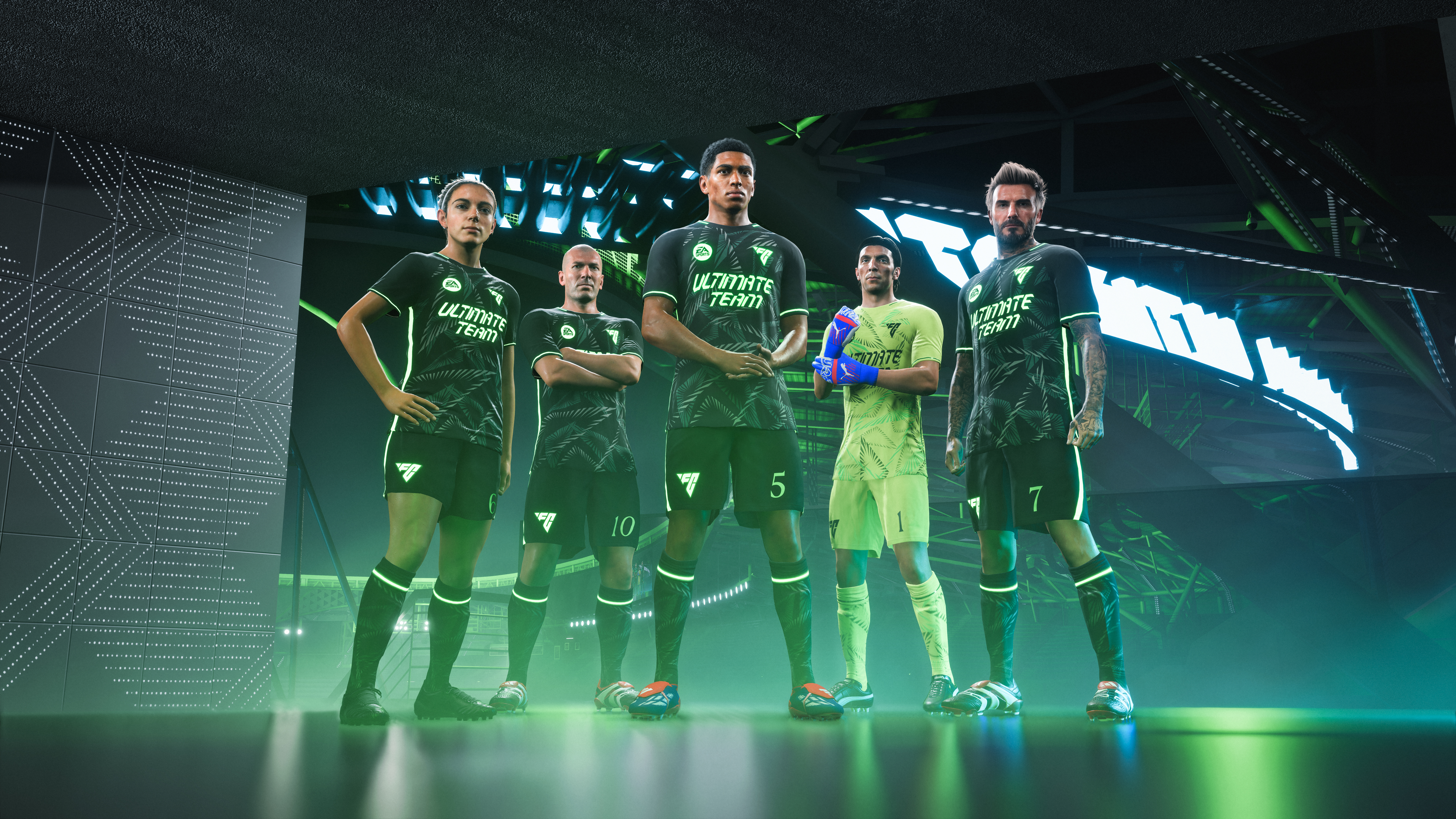 Fußballspieler in Ultimate Team Trikots posieren für ein Foto.