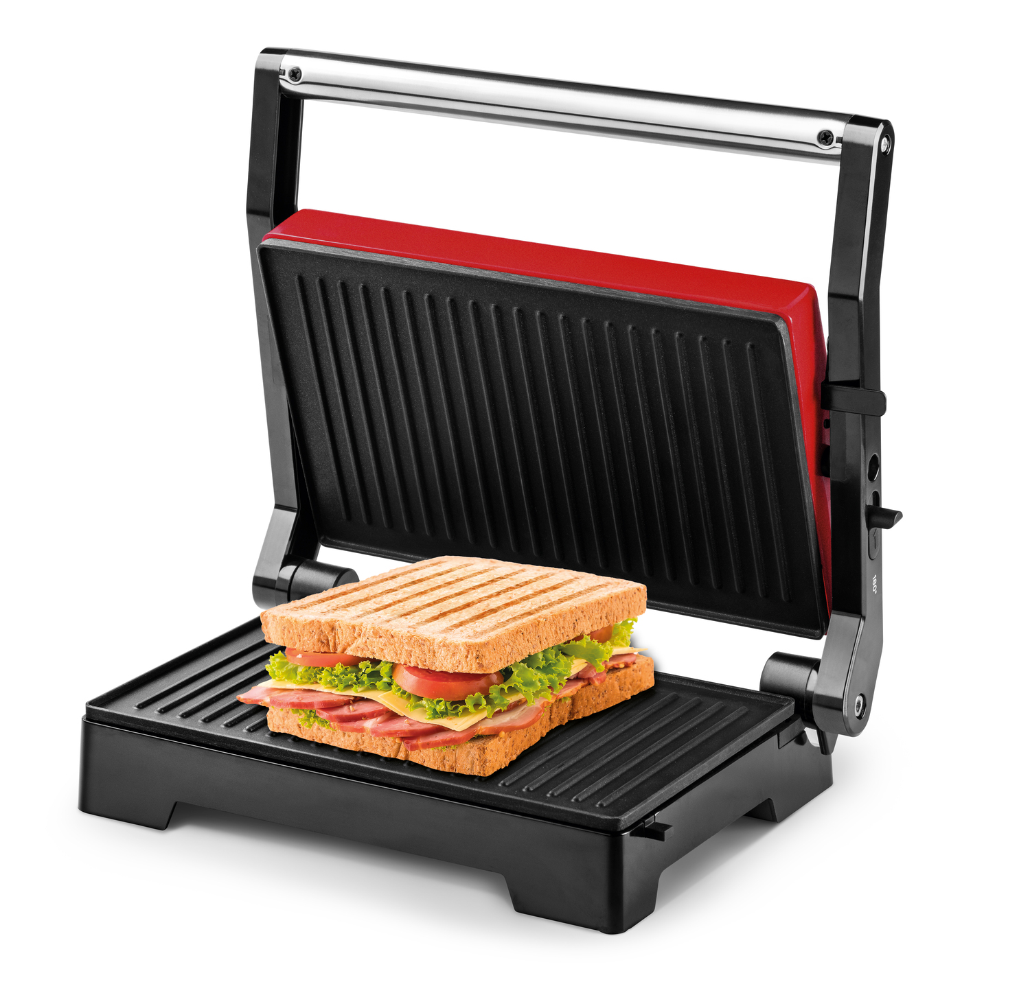 Sandwichera abierta con sándwich. Se ve pan, lechuga, tomate y carne dentro del sándwich.