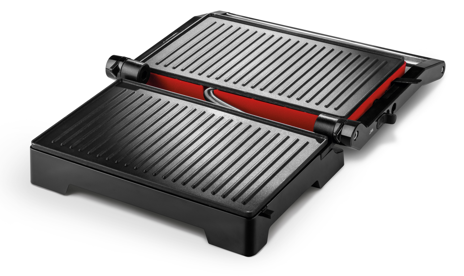 Una prensa panini abierta, negra y estriada, con interior rojo.