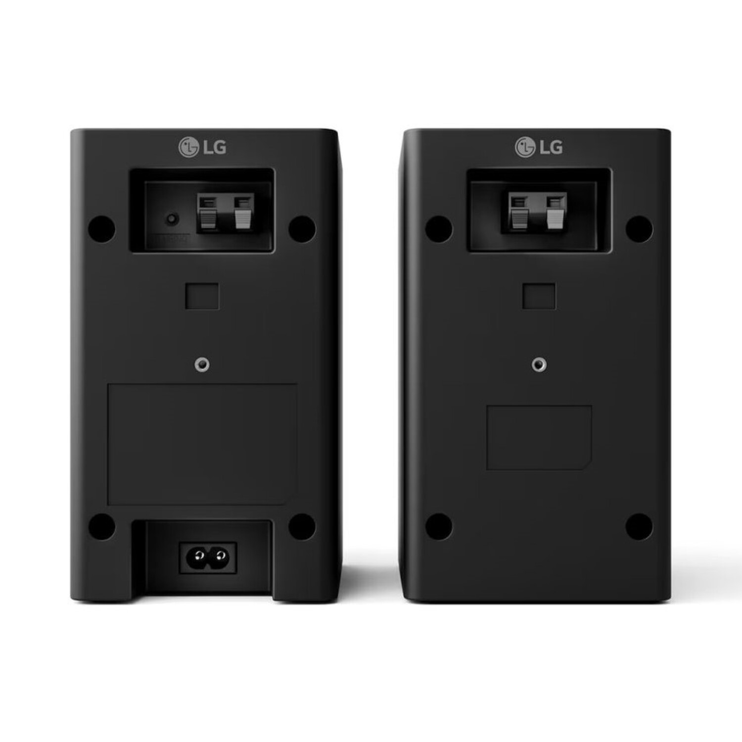 Two black LG speakers with their backs facing the camera. Connectors at the back.