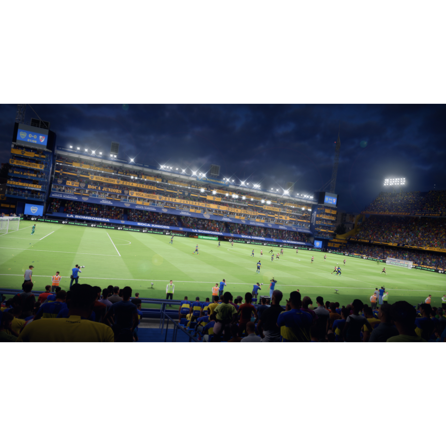 Een voetbalstadion 's nachts met mensen die een wedstrijd bekijken.