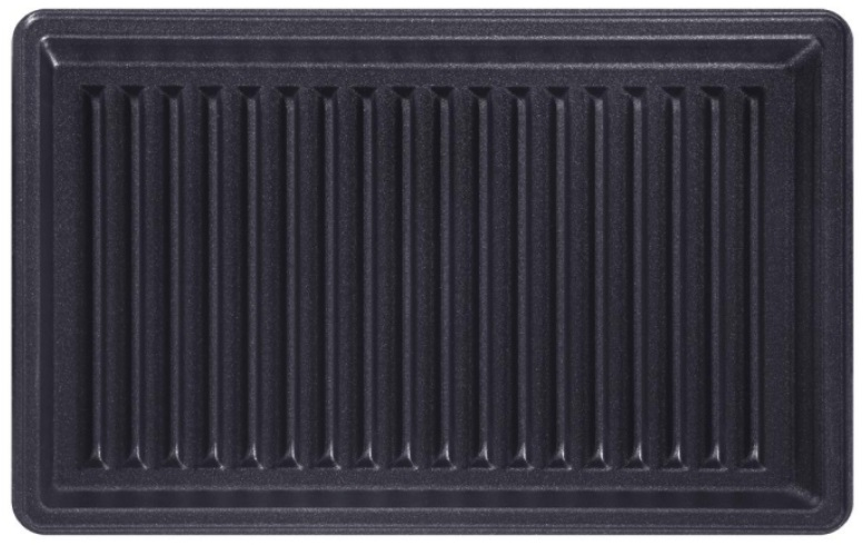 Czarna patelnia grillowa z równomiernie rozmieszczonymi żebrami, sfotografowana z góry.