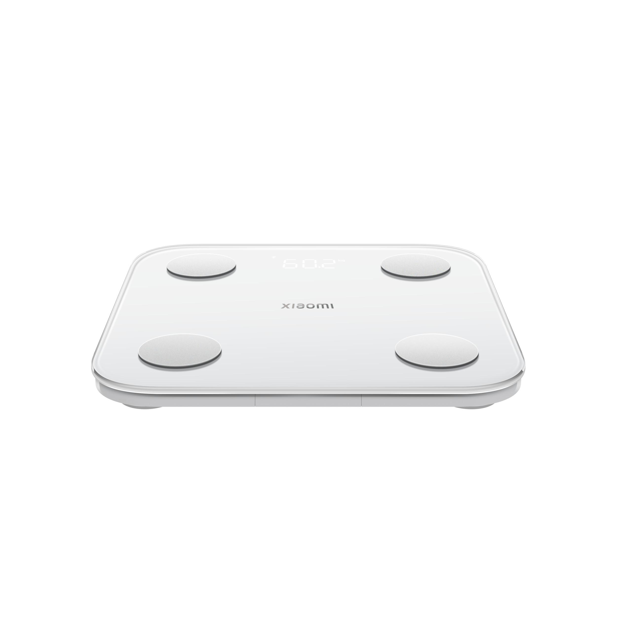 Weiße intelligente Waage mit vier kreisförmigen Pads, Xiaomi-Logo, auf weißem Hintergrund. Zeigt ein Gewicht.