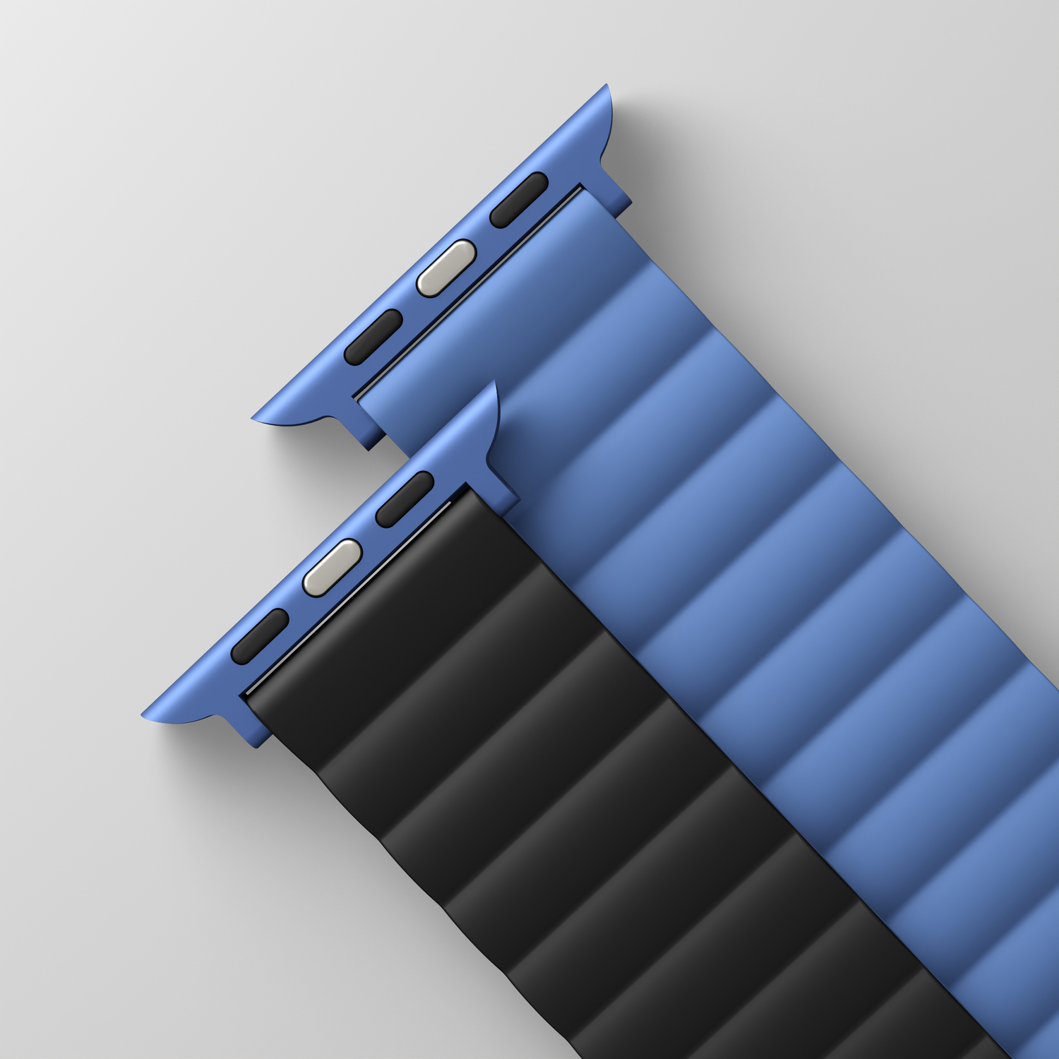 Two Apple Watch bands, one blue, one black. They are on a light gray background.