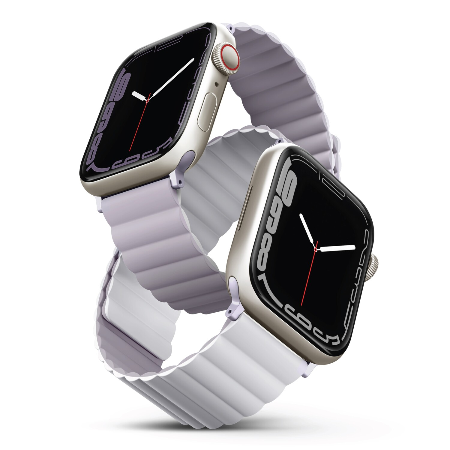 Two Apple Watches with white bands, showing time, on a white surface.