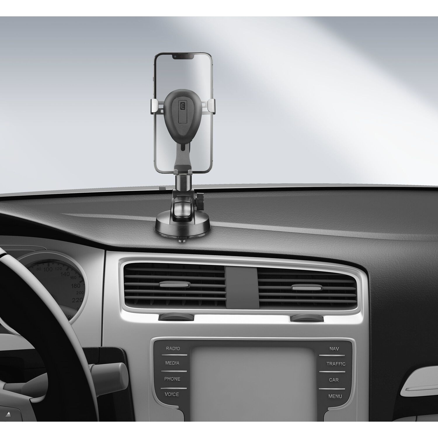 Un support de téléphone de voiture avec un téléphone attaché, monté sur le tableau de bord d'une voiture.