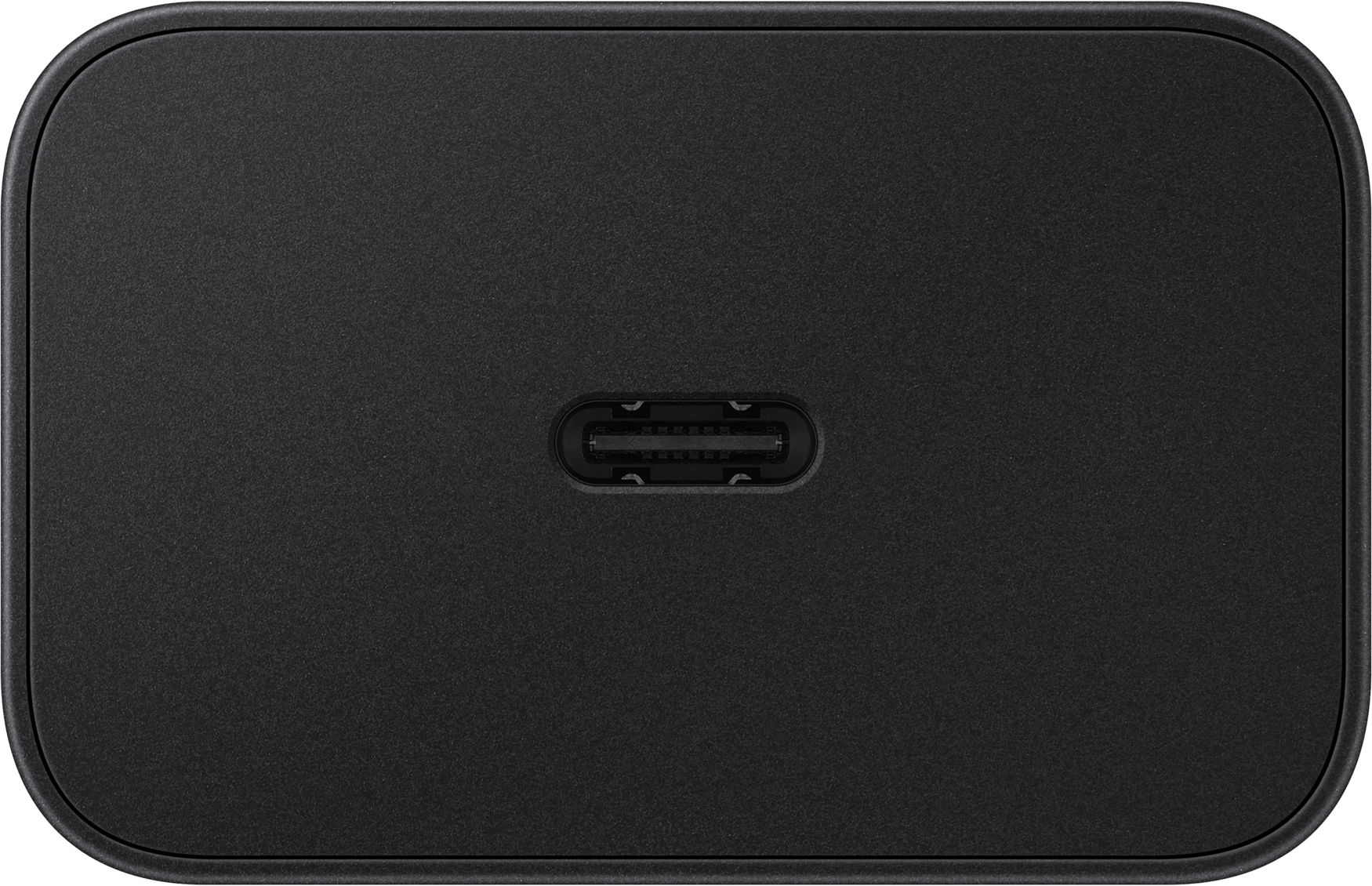 Un port USB-C noir sur un appareil noir, vue de dessus.