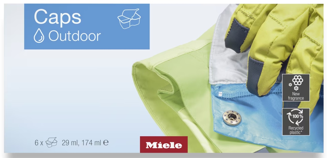 Opakowanie produktu Caps Outdoor. Pokazuje niebieskie pudełko, zielono-niebieską tkaninę z rękawicami i tekstem.