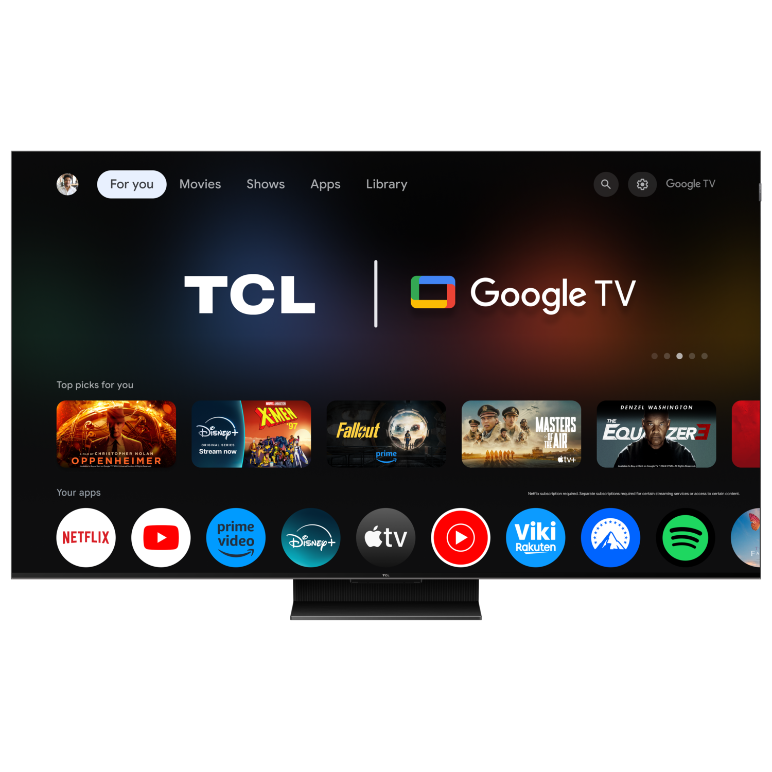 TCL Google TV screen displays movies and apps. The TV is on a black stand. The background is black.