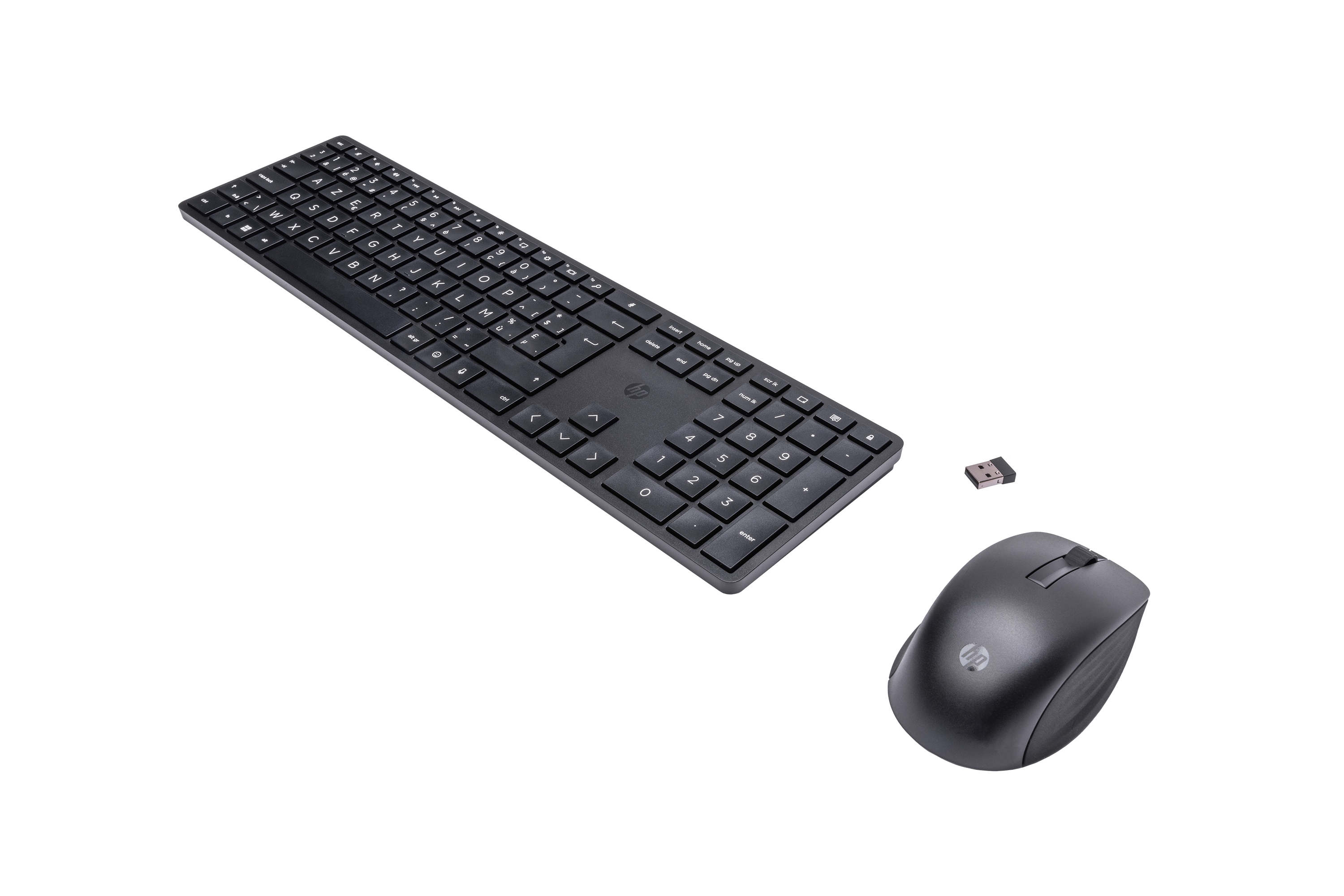 Black wireless keyboard, mouse, and a USB receiver on a black background.