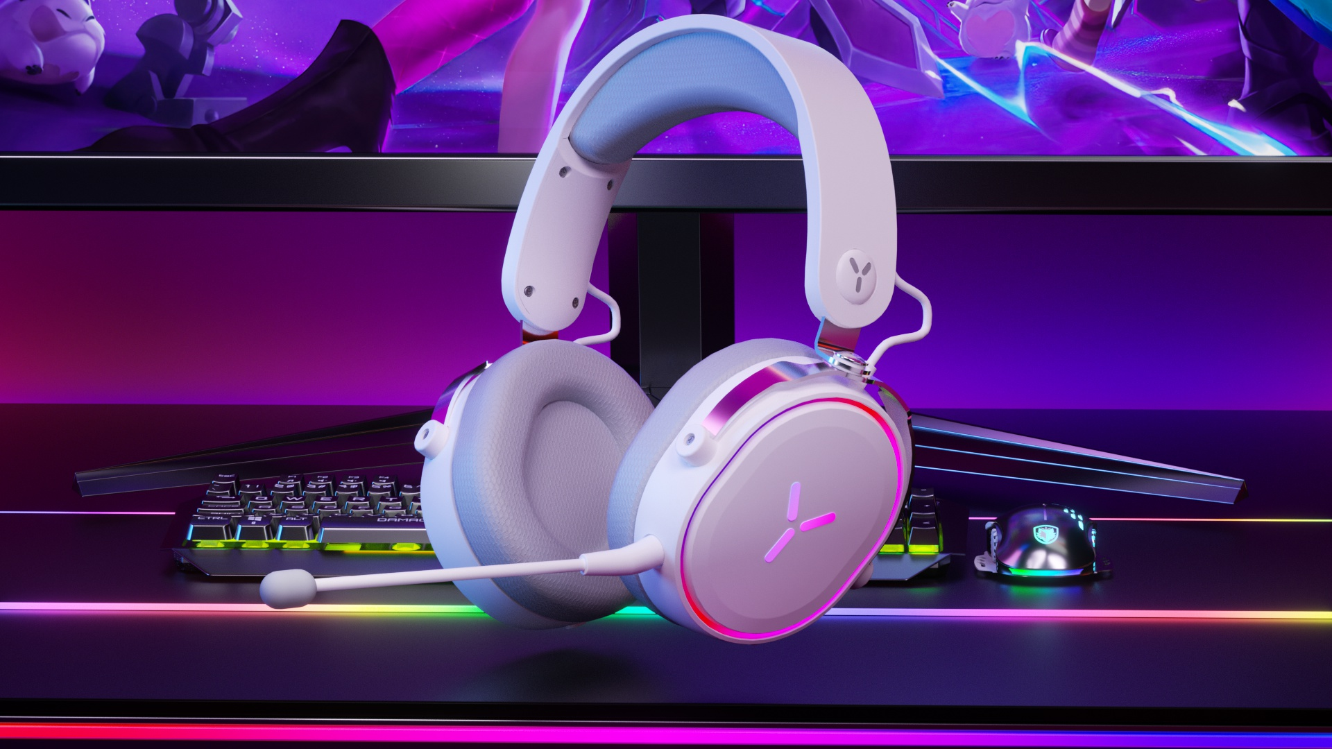 Weiße und graue Gaming-Kopfhörer mit Mikrofon, auf einem Schreibtisch mit Monitor.