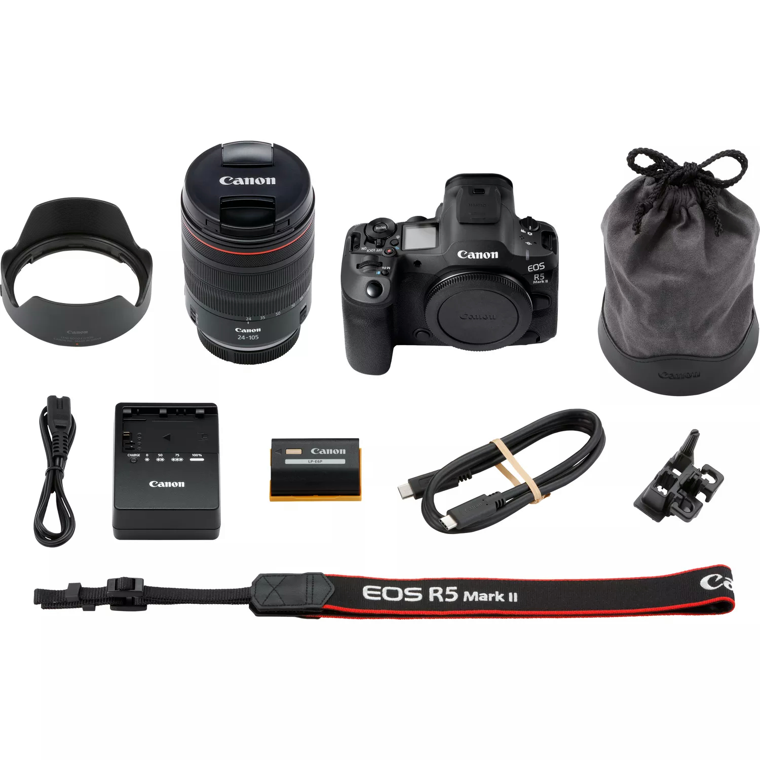 Canon EOS R5 Mark II Kamera-Kit mit Objektiv, Tasche, Ladegerät, Akku, Gurt, Kabeln und Zubehör auf weißem Hintergrund.