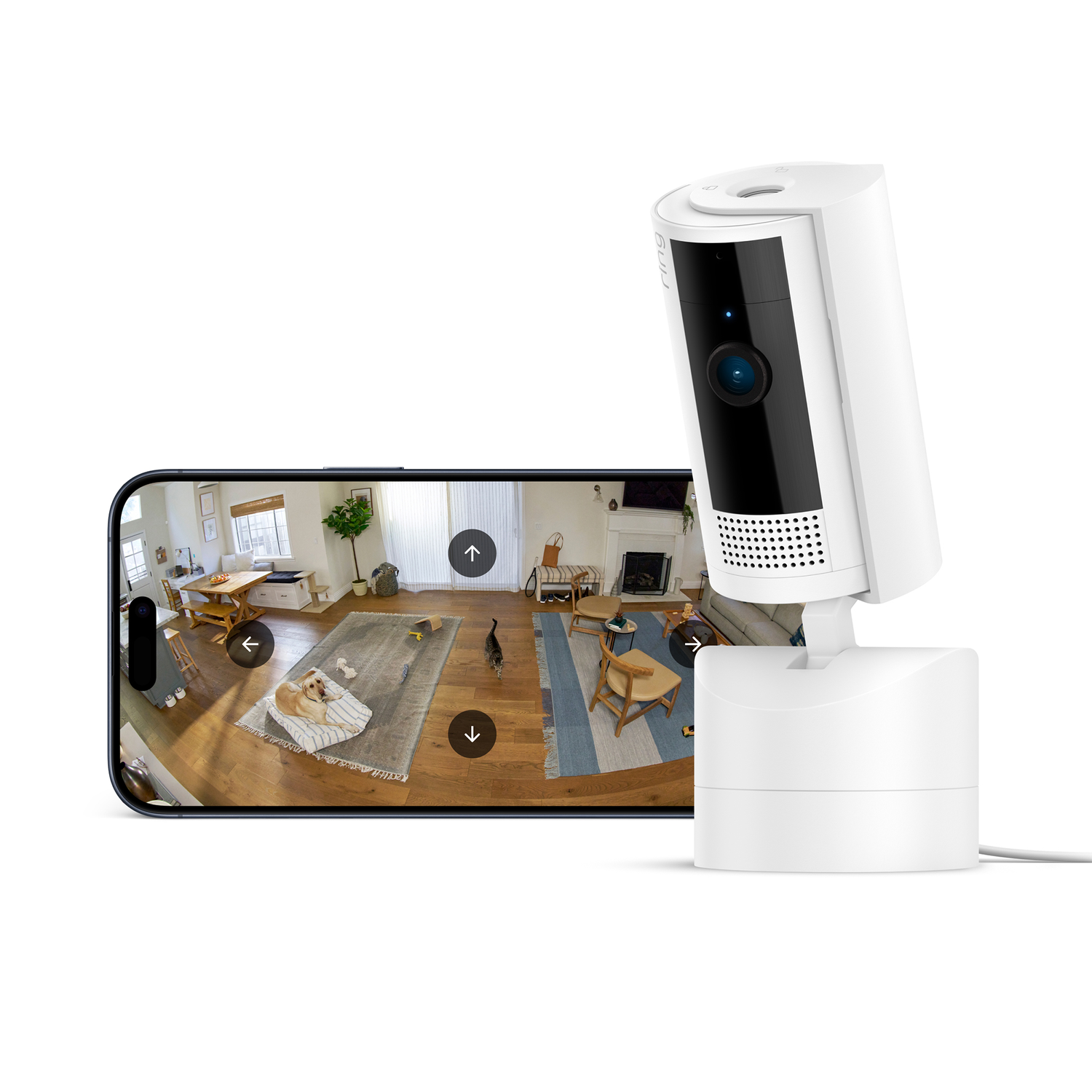 White security camera with a black lens and phone showing a house interior. The camera is pointed at the phone.