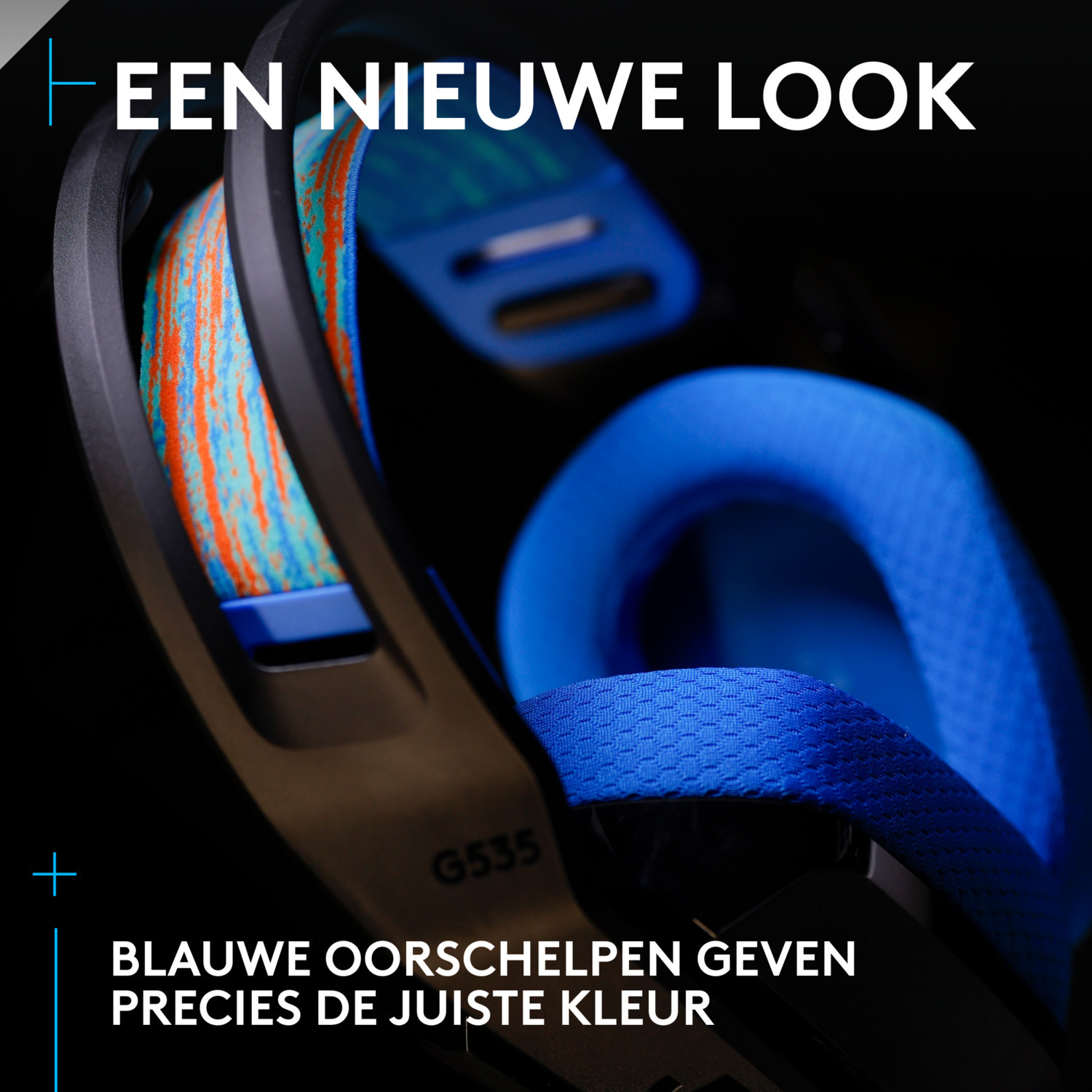 A blue and black gaming headset with orange accents on a dark background.