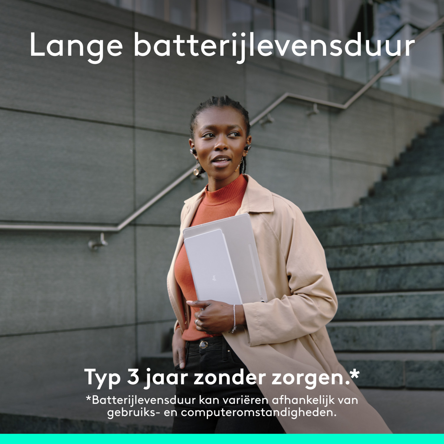 Woman walking down stairs, holding a laptop. Text above: Long battery life. Text below: Type 3 years without worry.