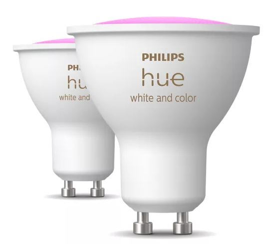 Dwie białe żarówki Philips Hue z różowymi wierzchami, biały tekst z boku.