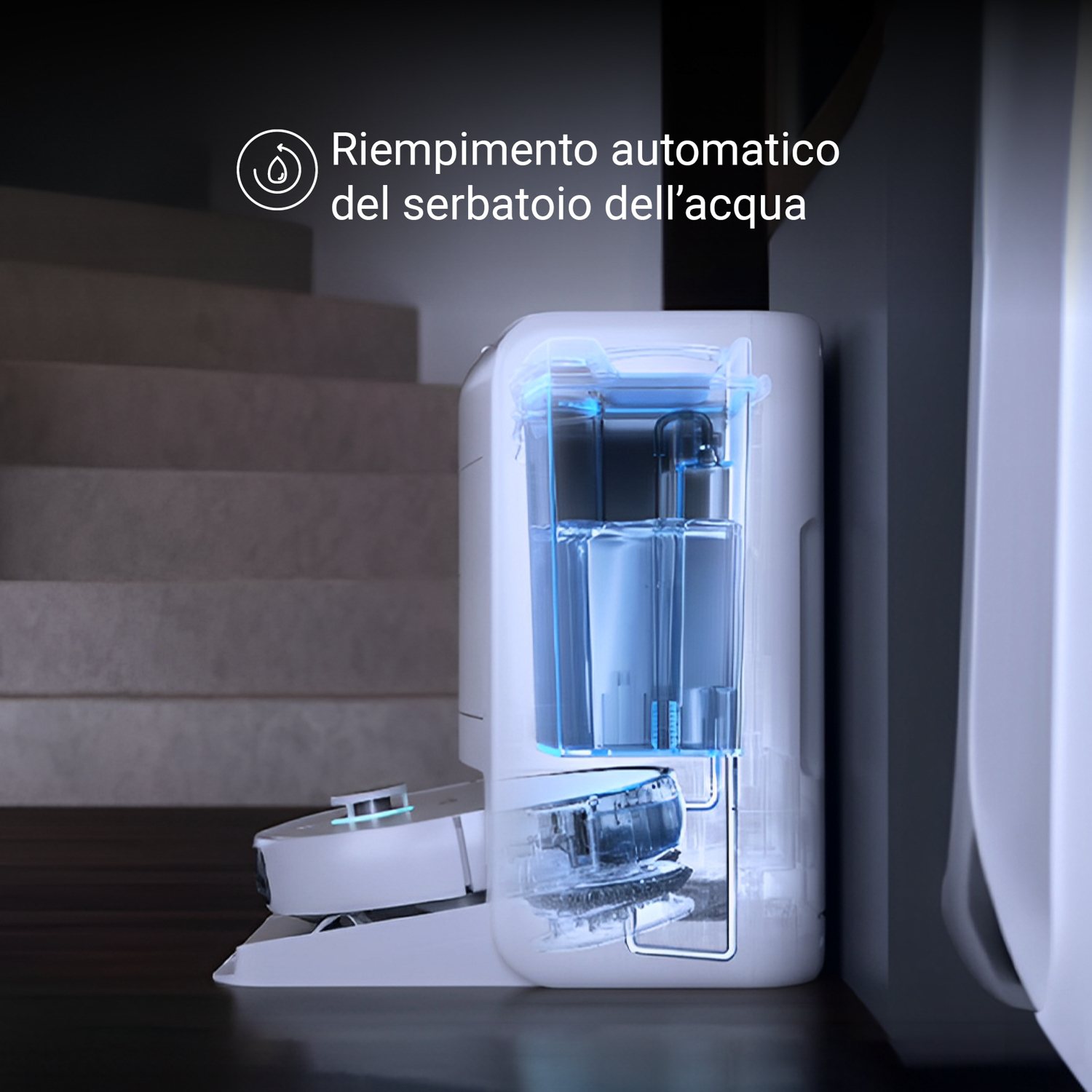Un aspirapolvere robot bianco con un contenitore d'acqua trasparente, che mostra il livello e i tubi.