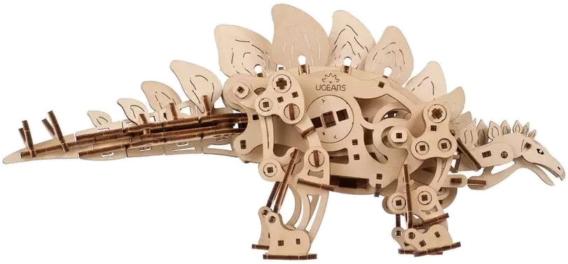 Fa Stegosaurus modell. Ez egy rejtvény, egymásba illeszkedő darabokkal. Fehér háttér előtt.