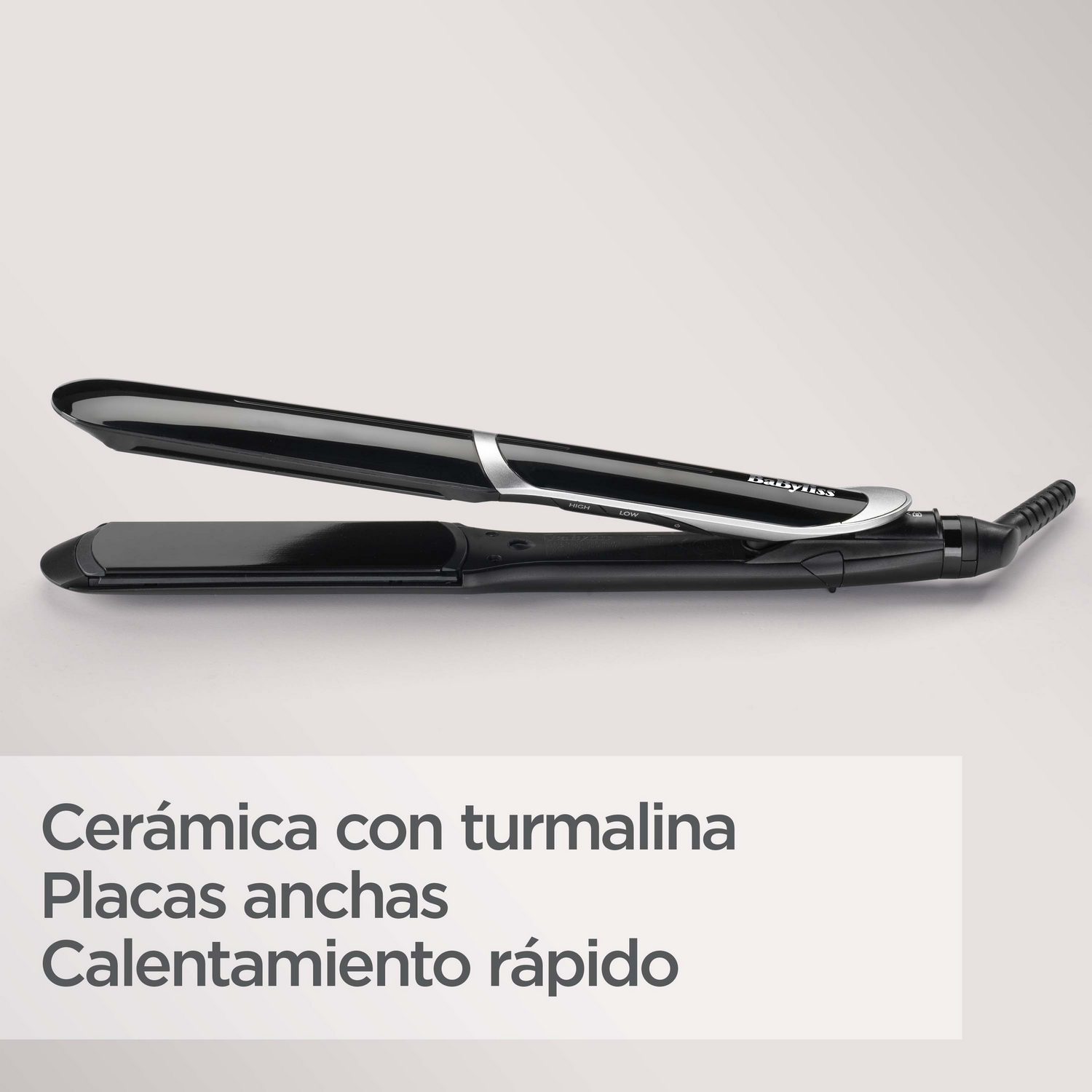 Plancha de pelo negra, con texto: Cerámica con turmalina, placas anchas, calentamiento rápido.