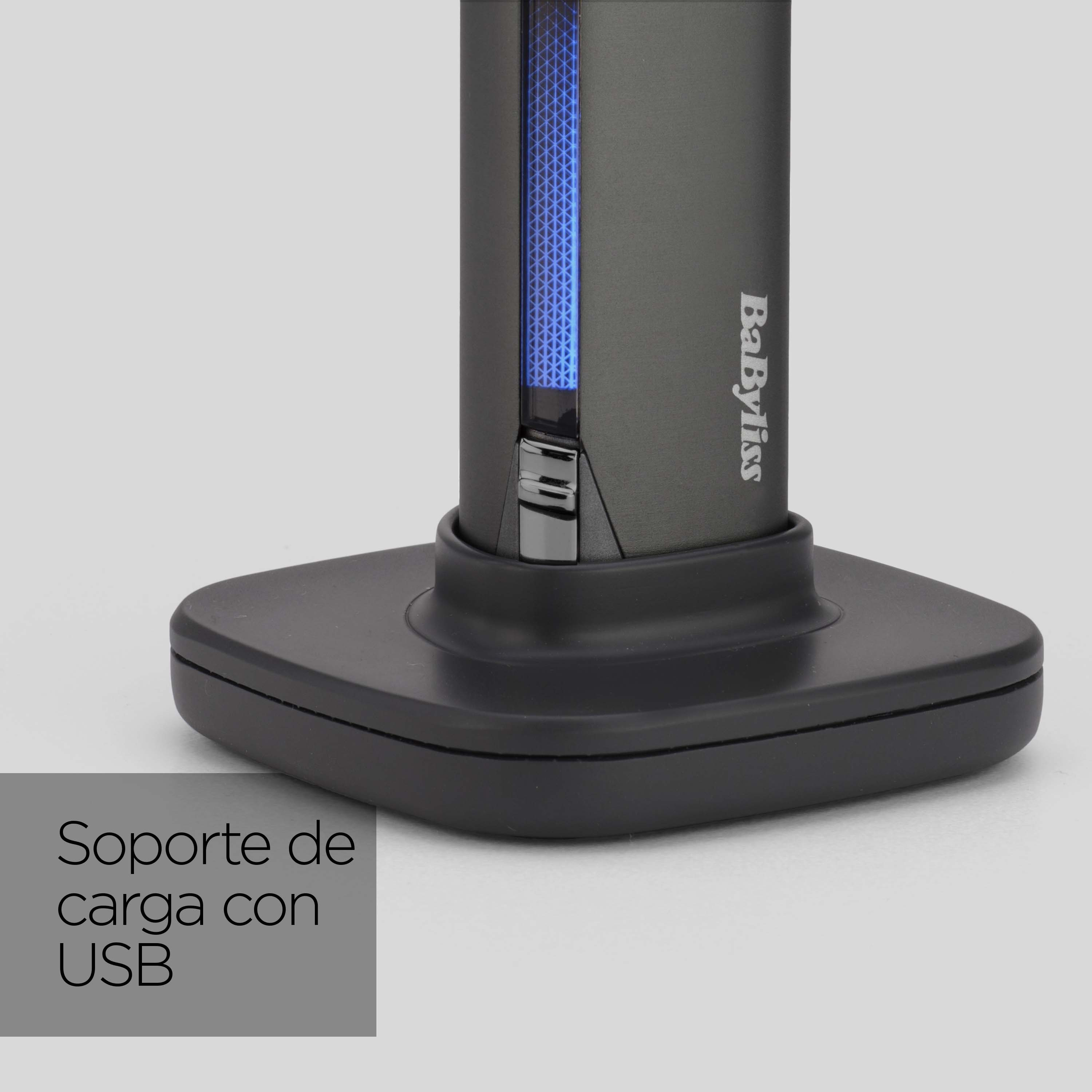Primer plano de un soporte de carga Babyliss con luz azul.