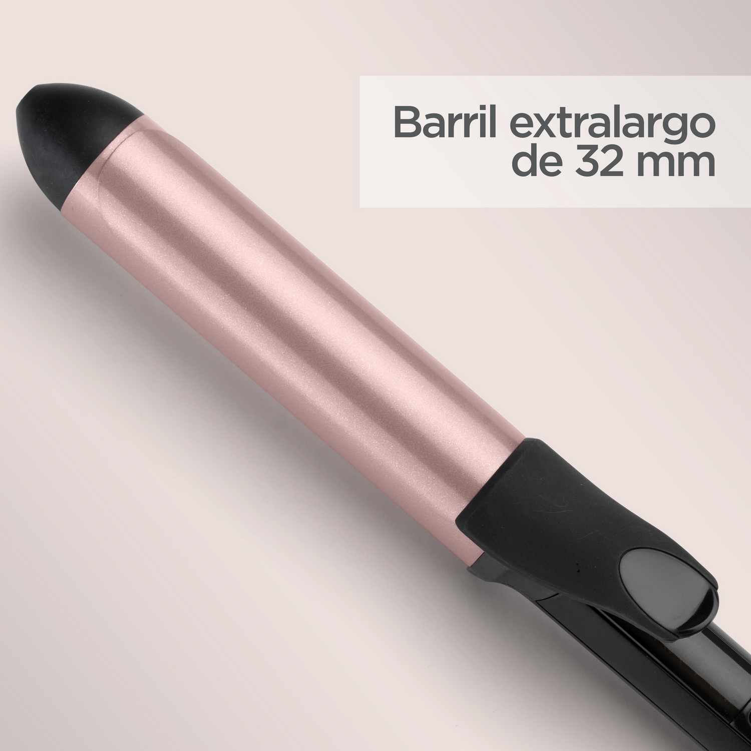 Rizador oro rosa. Mango negro, texto: Barril extralargo de 32 mm.