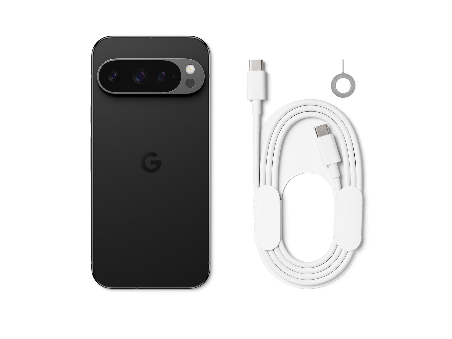 Teléfono Google Pixel 7 negro con accesorios. Teléfono, cable y herramienta SIM.