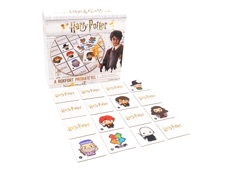 Harry Potter társasjáték. A Harry Potter szereplőivel és jeleneteivel ellátott kártyák a doboz körül vannak.