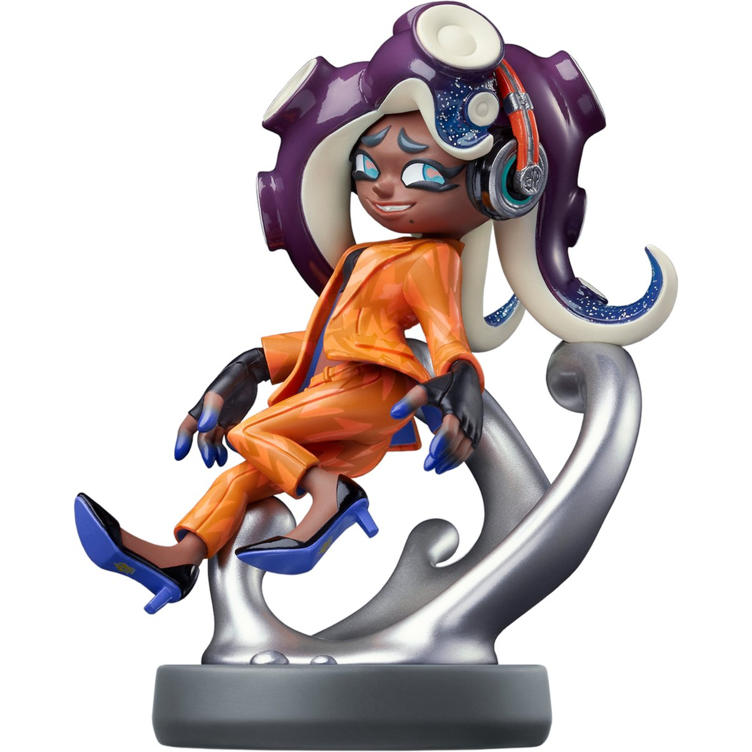 Figure of a cartoon character in orange suit, black gloves and shoes, with headphones.