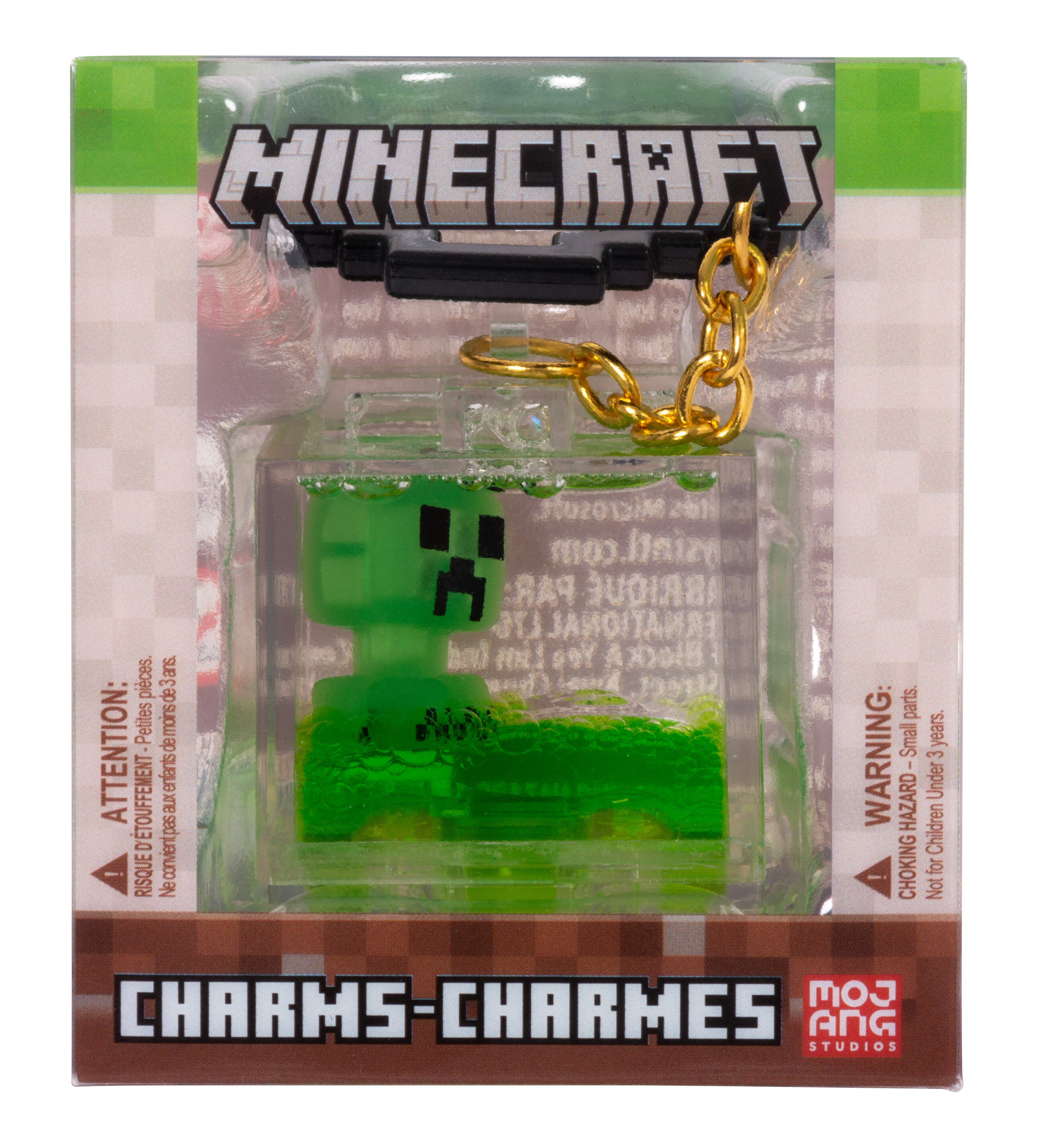 Minecraft Creeper-Anhänger in Verpackung. Grüne Creeper-Figur in durchsichtigem Kunststoffbehälter mit goldener Kette.