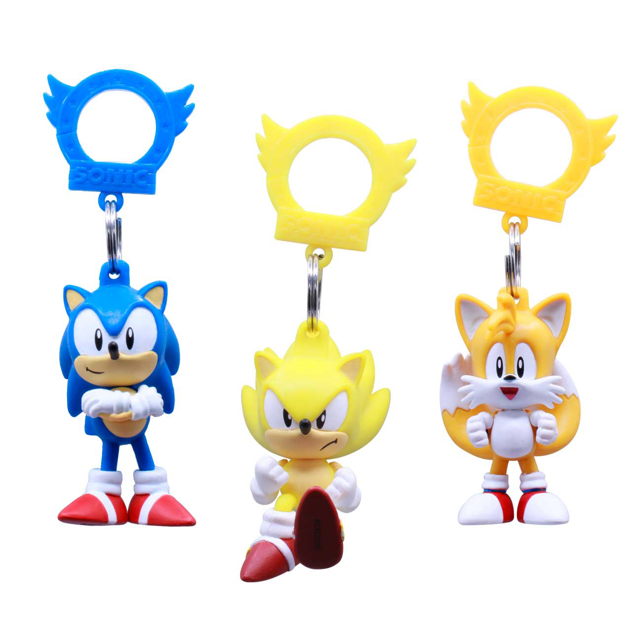 Drei Sonic the Hedgehog Schlüsselanhänger. Sonic, Super Sonic und Tails.