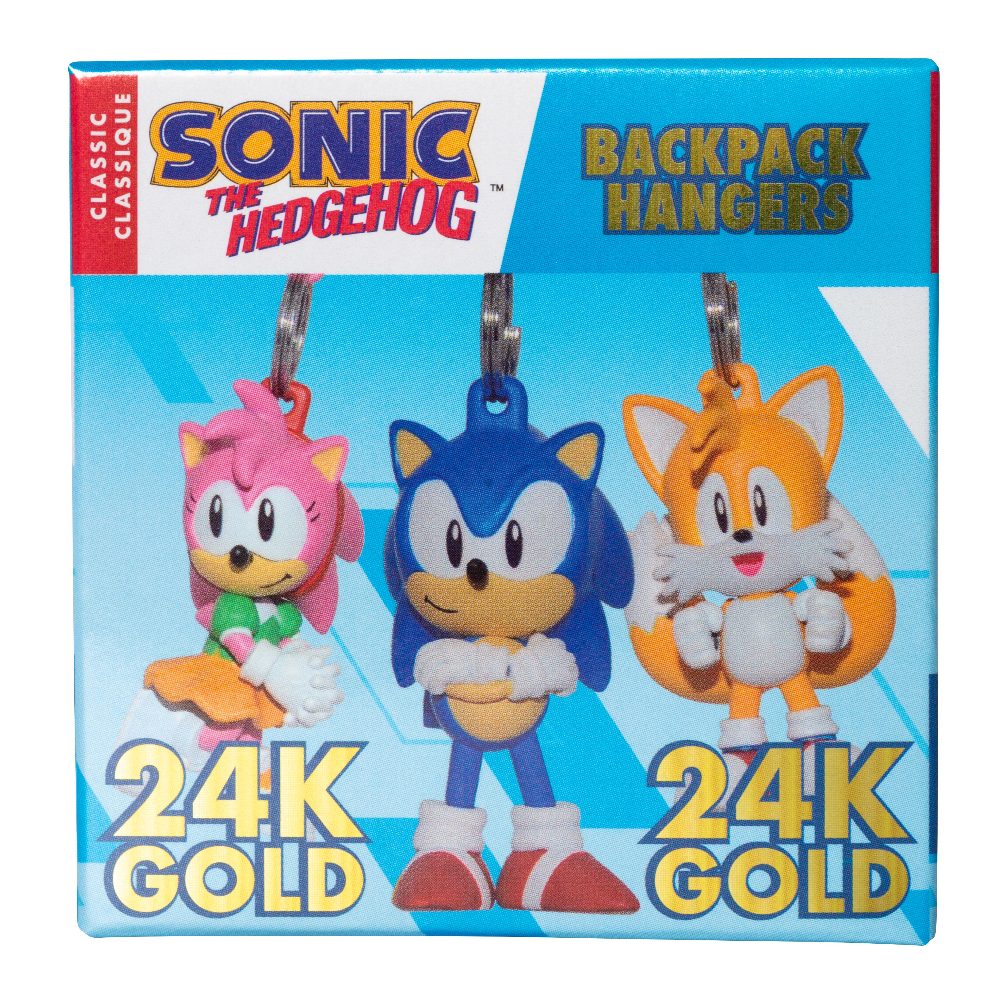 Eine Schachtel mit Sonic the Hedgehog Rucksackanhängern. Zeigt Amy, Sonic und Tails, mit 24K Gold Text.