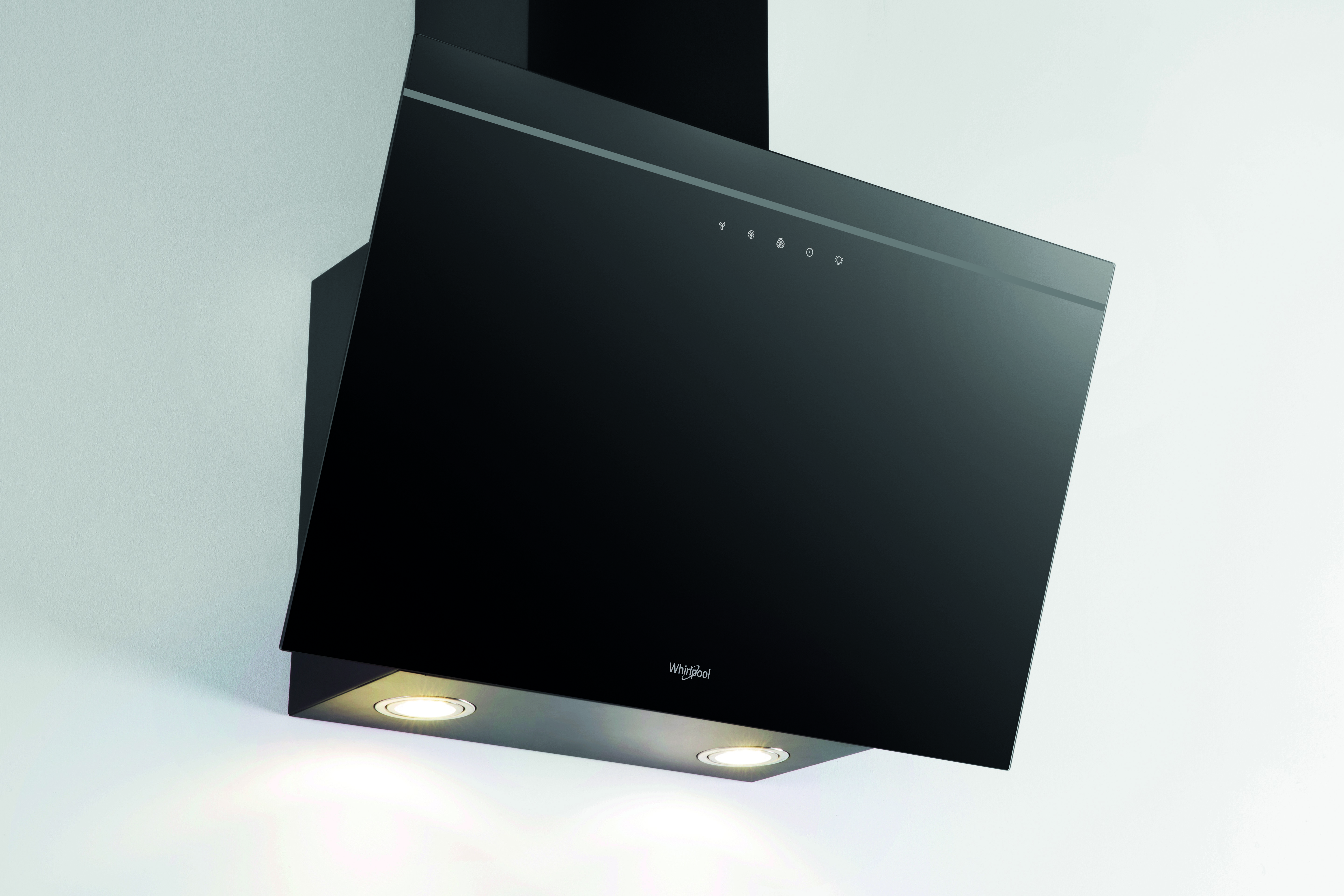 Una campana extractora negra con luces, montada en una pared blanca, electrodoméstico de cocina moderno.