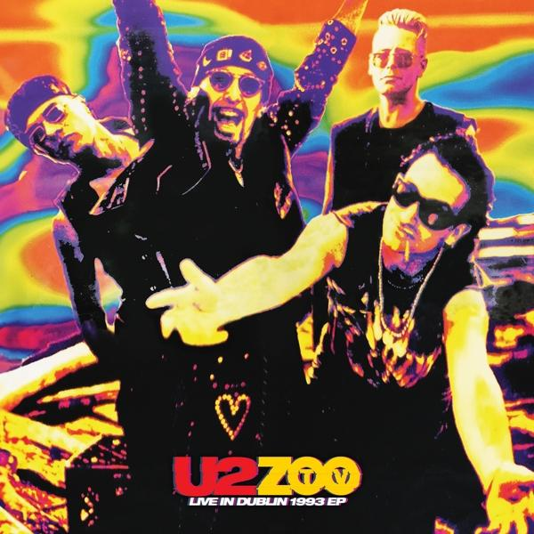 U2-Band-Albumcover mit vier Bandmitgliedern in lebendigen Farben.